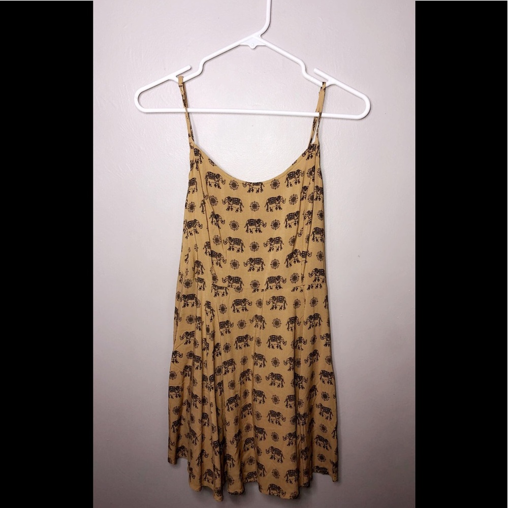 cute mustard elephant print dress.